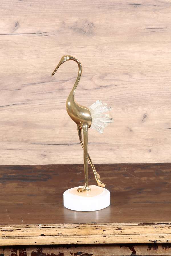 Brass swan figurine, made in Korea: 23,500 ppm Lead (90 ppm is unsafe for  kids) + 388 ppm Antimony.